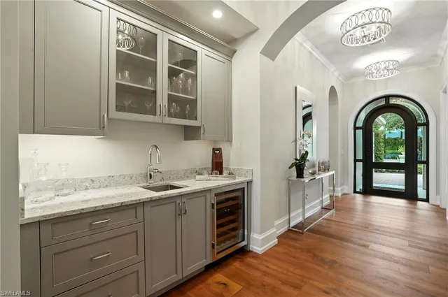 a view of a kitchen with a sink and dishwasher