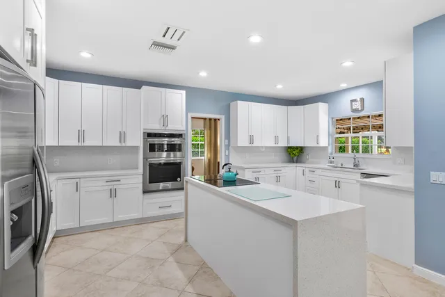 $1,350,000 | 110 Glenbrook Court, Atlantis, FL 33462