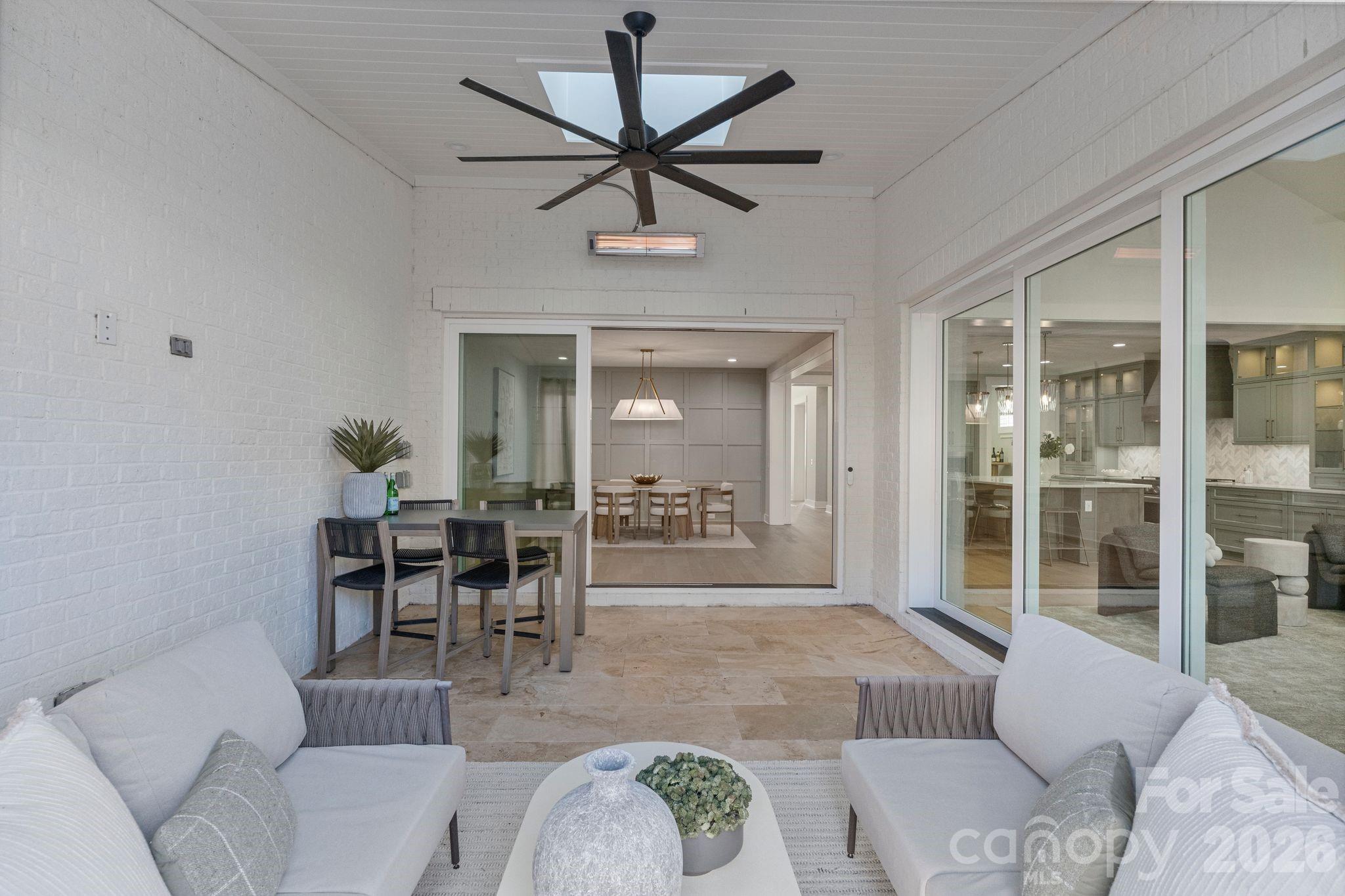 4031 Pritchard Place Fort Mill, SC 29715 - Photo 18 of 48 a dining room with furniture and a large window