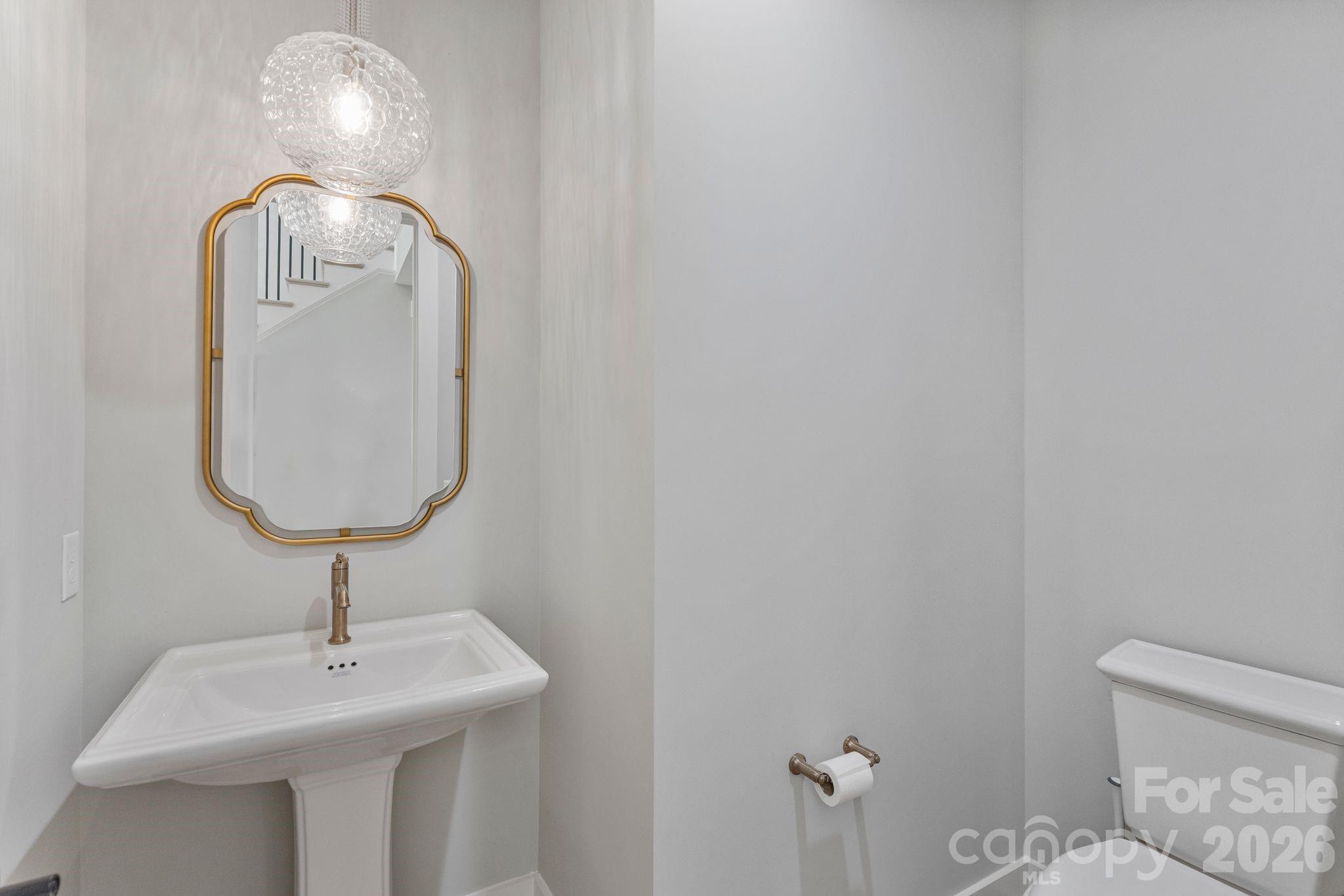 4031 Pritchard Place Fort Mill, SC 29715 - Photo 33 of 48 a close view of a light fixtures and a sink