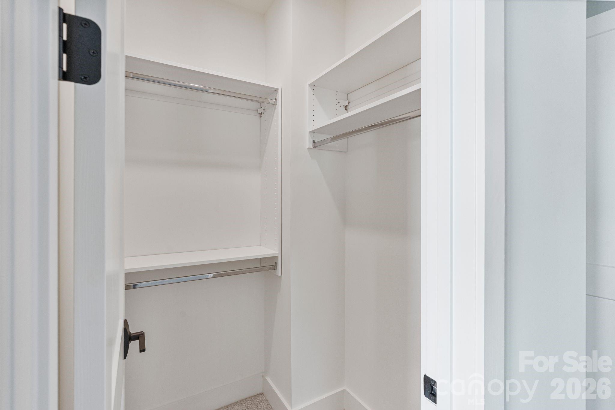 4031 Pritchard Place Fort Mill, SC 29715 - Photo 39 of 48 a bathroom with a glass shower door