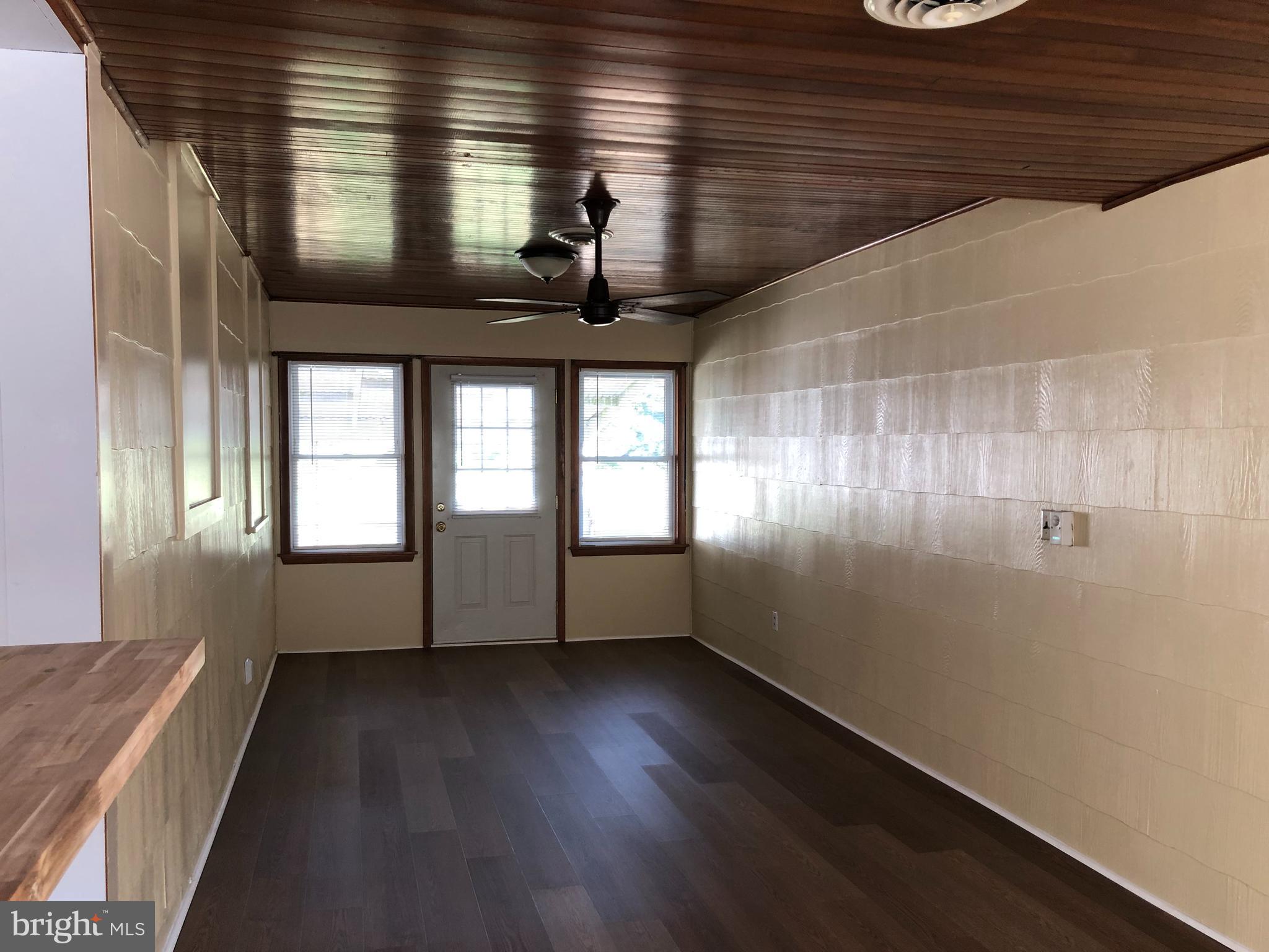 9269 Sharptown Road Laurel, DE 19956 - Photo 11 of 39 Family room off the kitchen! Exterior doorway!