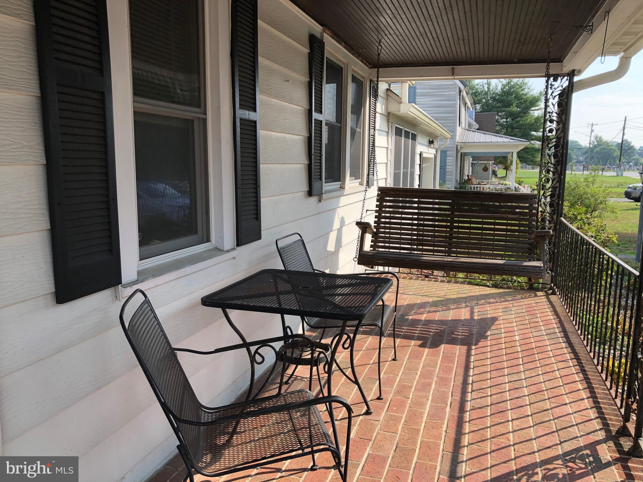 9269 Sharptown Road Laurel, DE 19956 - Photo 5 of 39 Front porch, brick floor