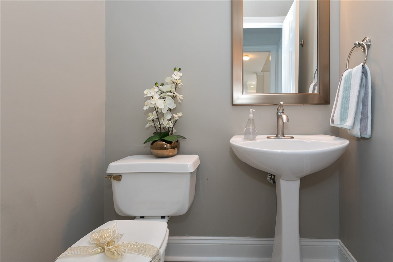 1904 Capers Court Raleigh, NC 27612 - Photo 14 of 29 Another update room! Powder room with high ceilings and pedestal sink Bathroom