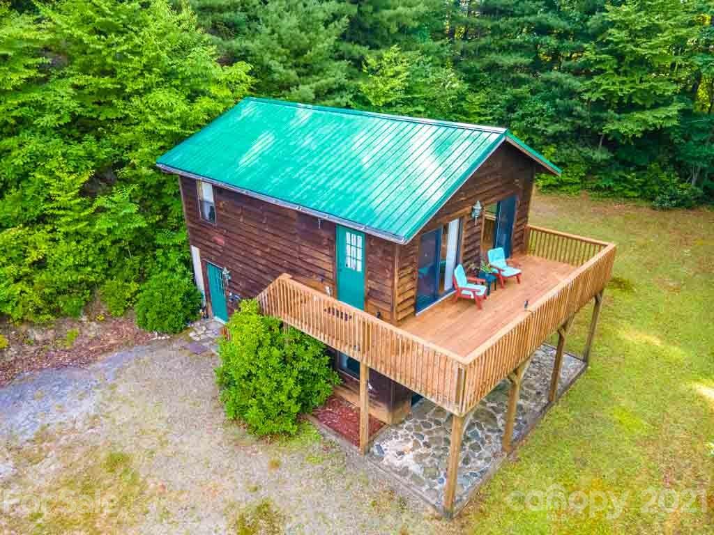 195 Mopey Maple Road Waynesville, NC 28785 - Photo 5 of 23 an aerial view of houses with backyard