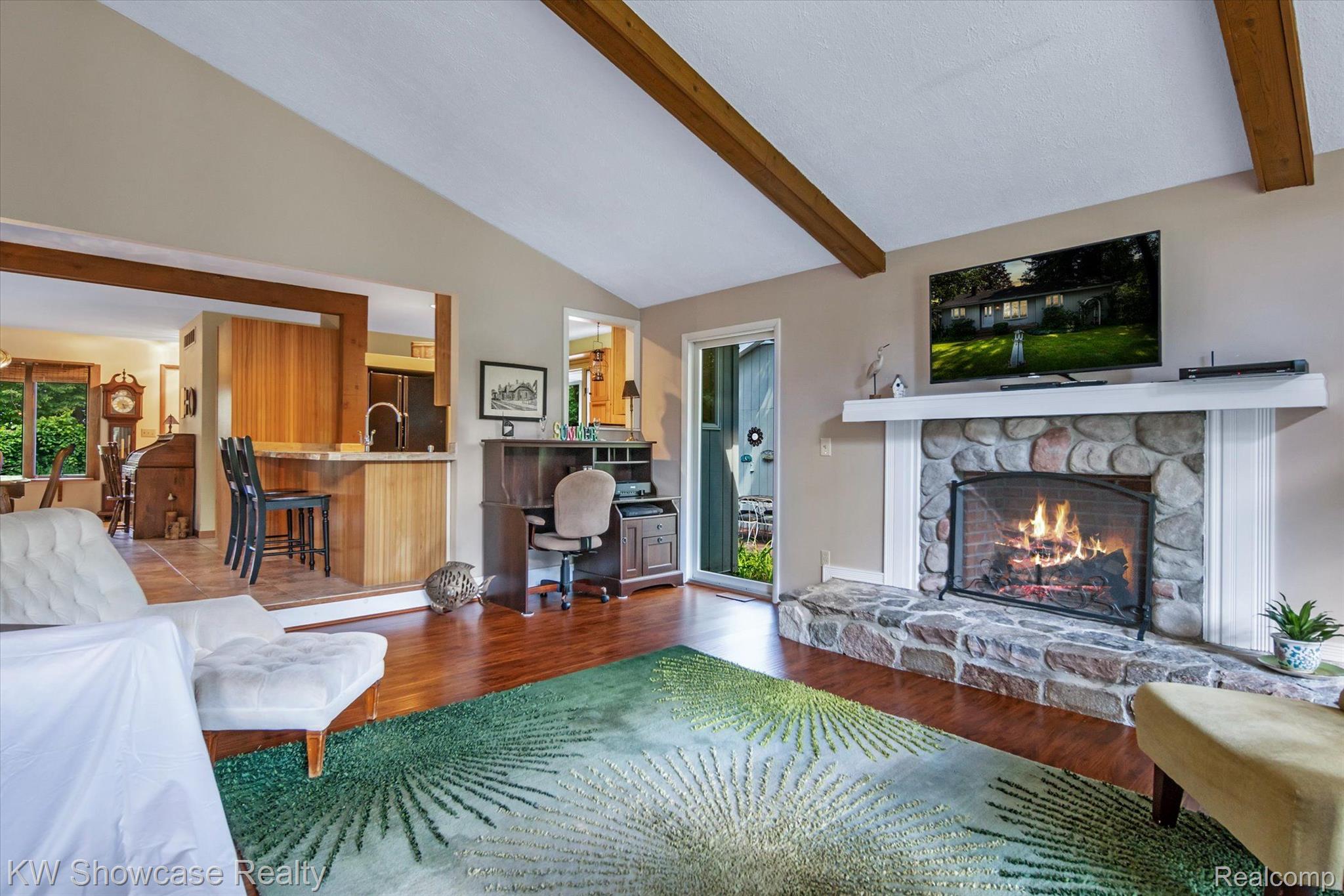9220 Mcgregor Road Pinckney, MI 48169 - Photo 9 of 40 The Family Room and its BEAUTIFUL fireplace.