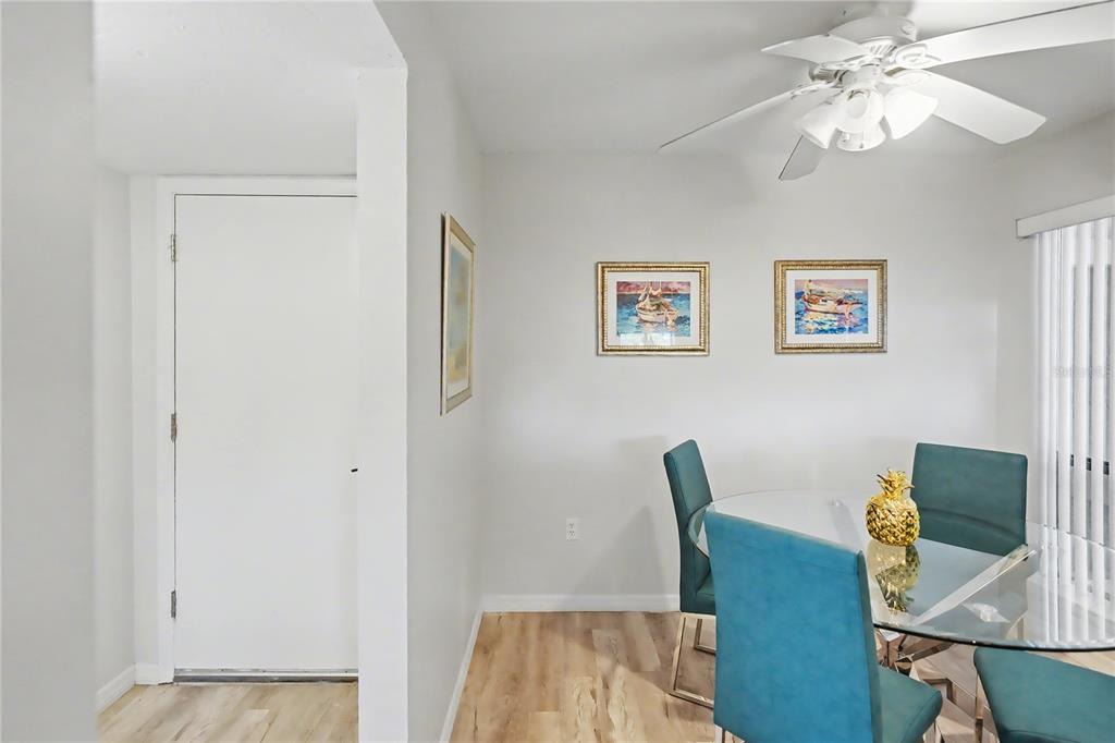 6157 Midnight Pass Road, Unit E23 Sarasota, FL 34242 - Photo 12 of 49 a view of a workspace with furniture and a window