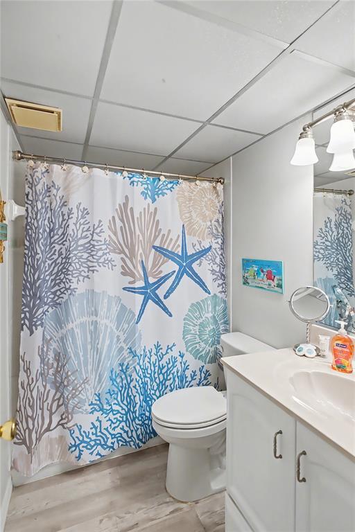 6157 Midnight Pass Road, Unit E23 Sarasota, FL 34242 - Photo 24 of 49 a bathroom with a sink and a toilet