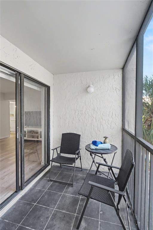 6157 Midnight Pass Road, Unit E23 Sarasota, FL 34242 - Photo 28 of 49 a outdoor space with furniture