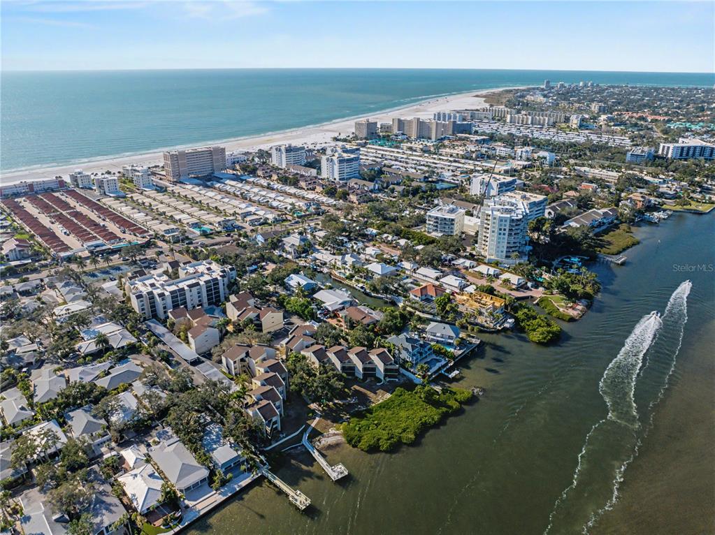 6157 Midnight Pass Road, Unit E23 Sarasota, FL 34242 - Photo 49 of 49 an aerial view of a house with a lake view