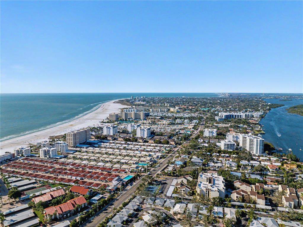 6157 Midnight Pass Road, Unit E23 Sarasota, FL 34242 - Photo 5 of 49 an aerial view of a city