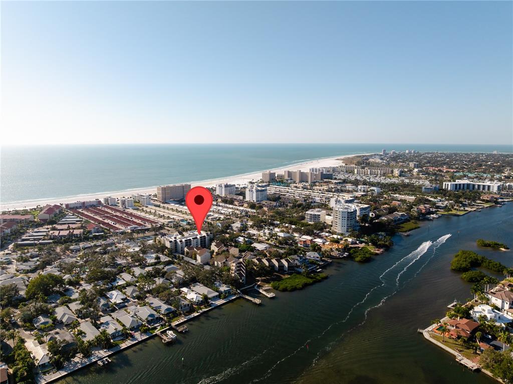6157 Midnight Pass Road, Unit E23 Sarasota, FL 34242 - Photo 6 of 49 an aerial view of multiple house