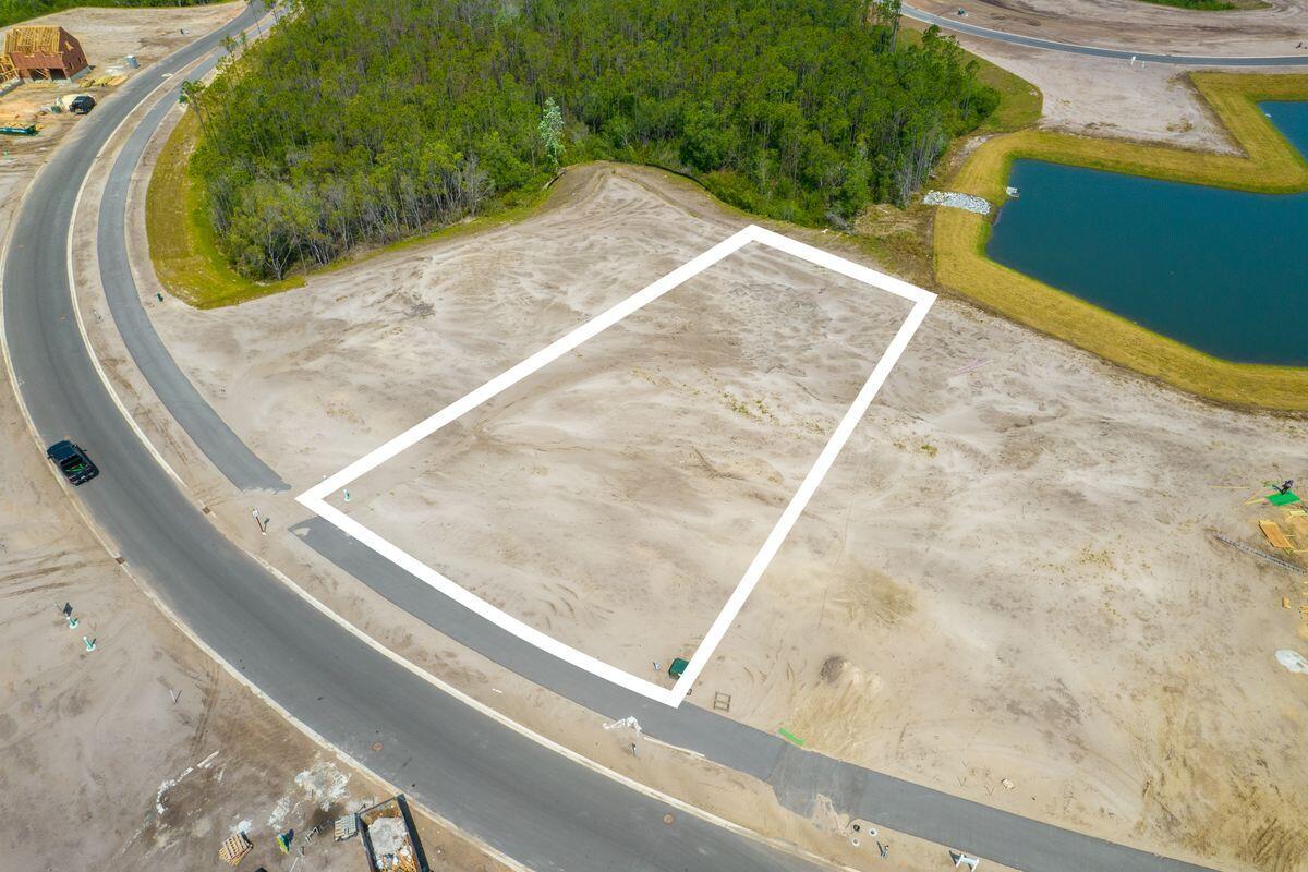 Lot 29 Windsong Inlet Beach Inlet Beach, FL 32461 - Photo 2 of 12 a view of a swimming pool with sitting area