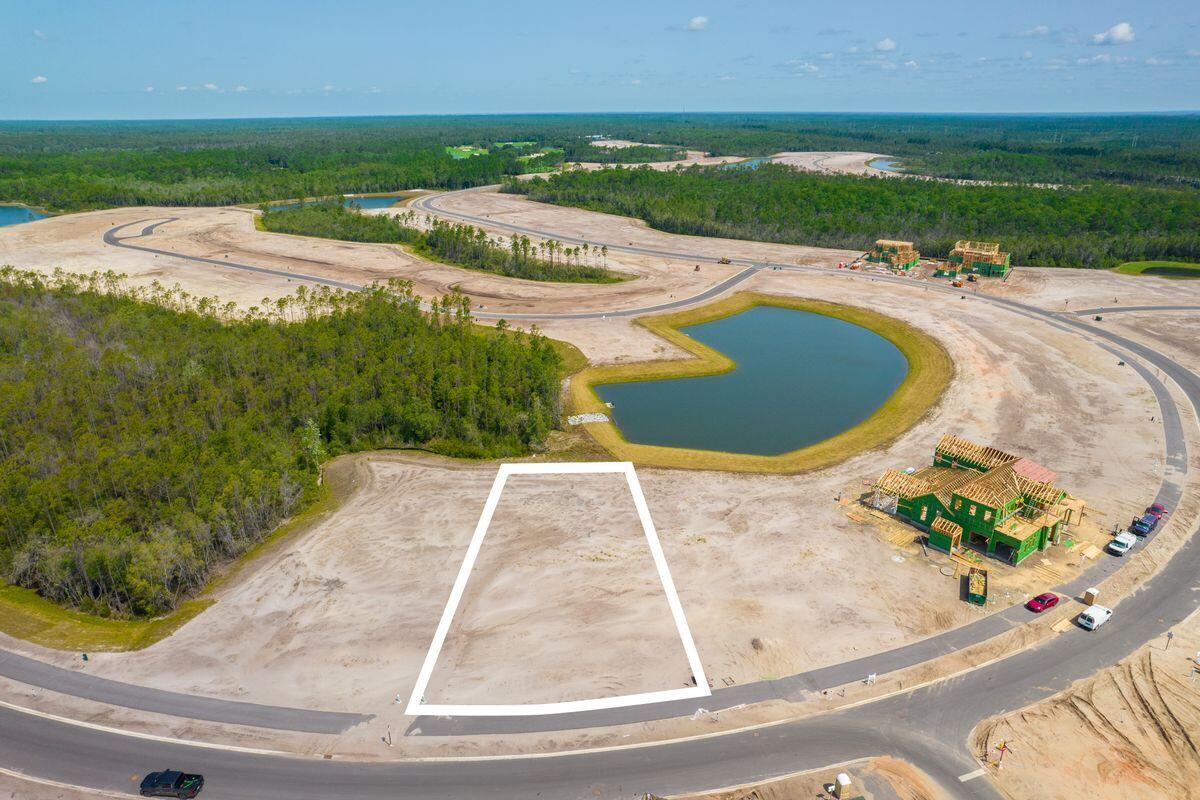Lot 29 Windsong Inlet Beach Inlet Beach, FL 32461 - Photo 8 of 12 a view of a swimming pool with a yard
