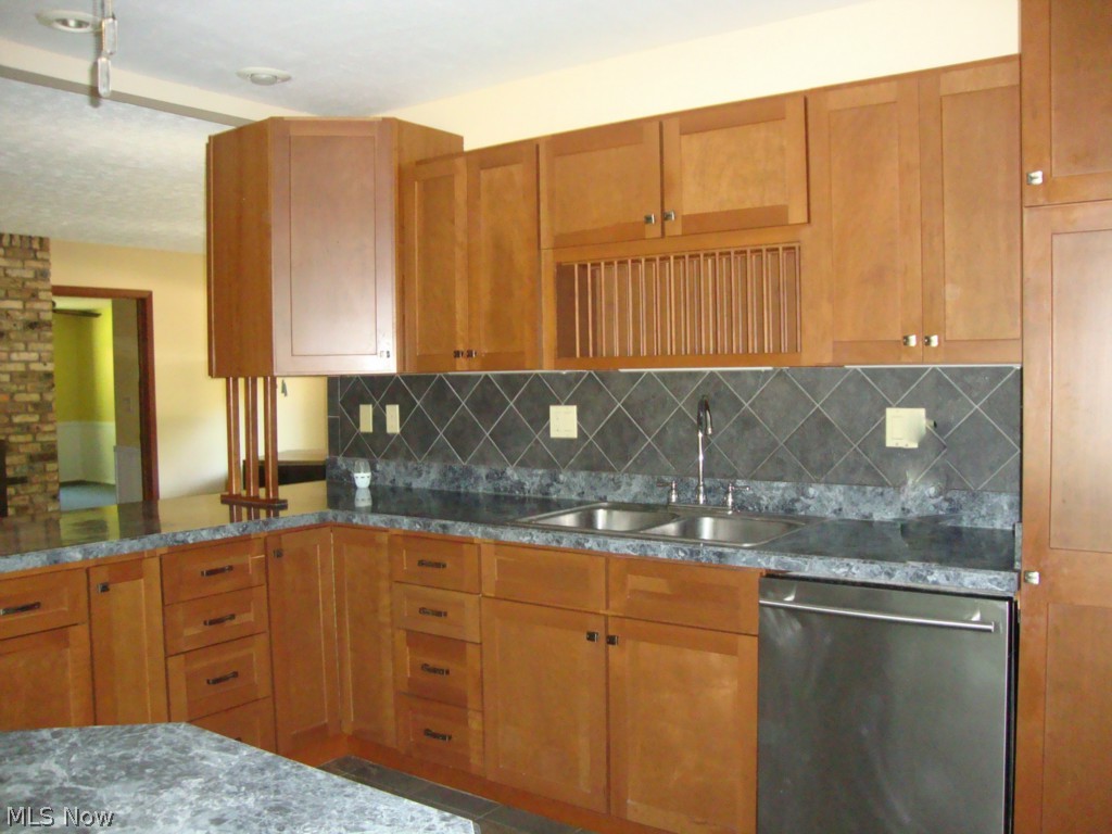 5698 Rock Point Circle North Ridgeville, OH 44039 - Photo 7 of 25 The kitchen is open to the family room.