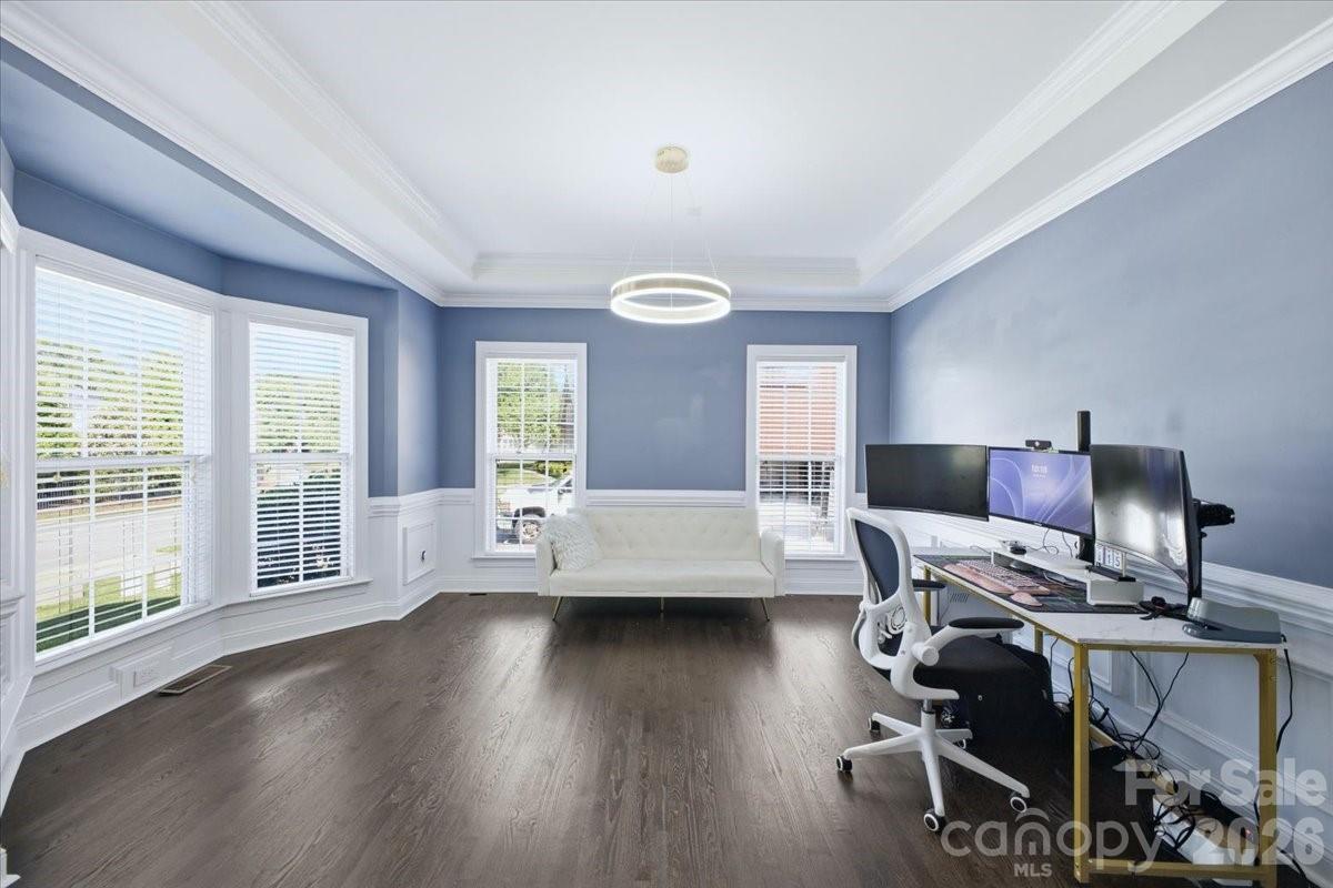 1825 Laveta Road Charlotte, NC 28269 - Photo 8 of 48 a living room with furniture and a wooden floor