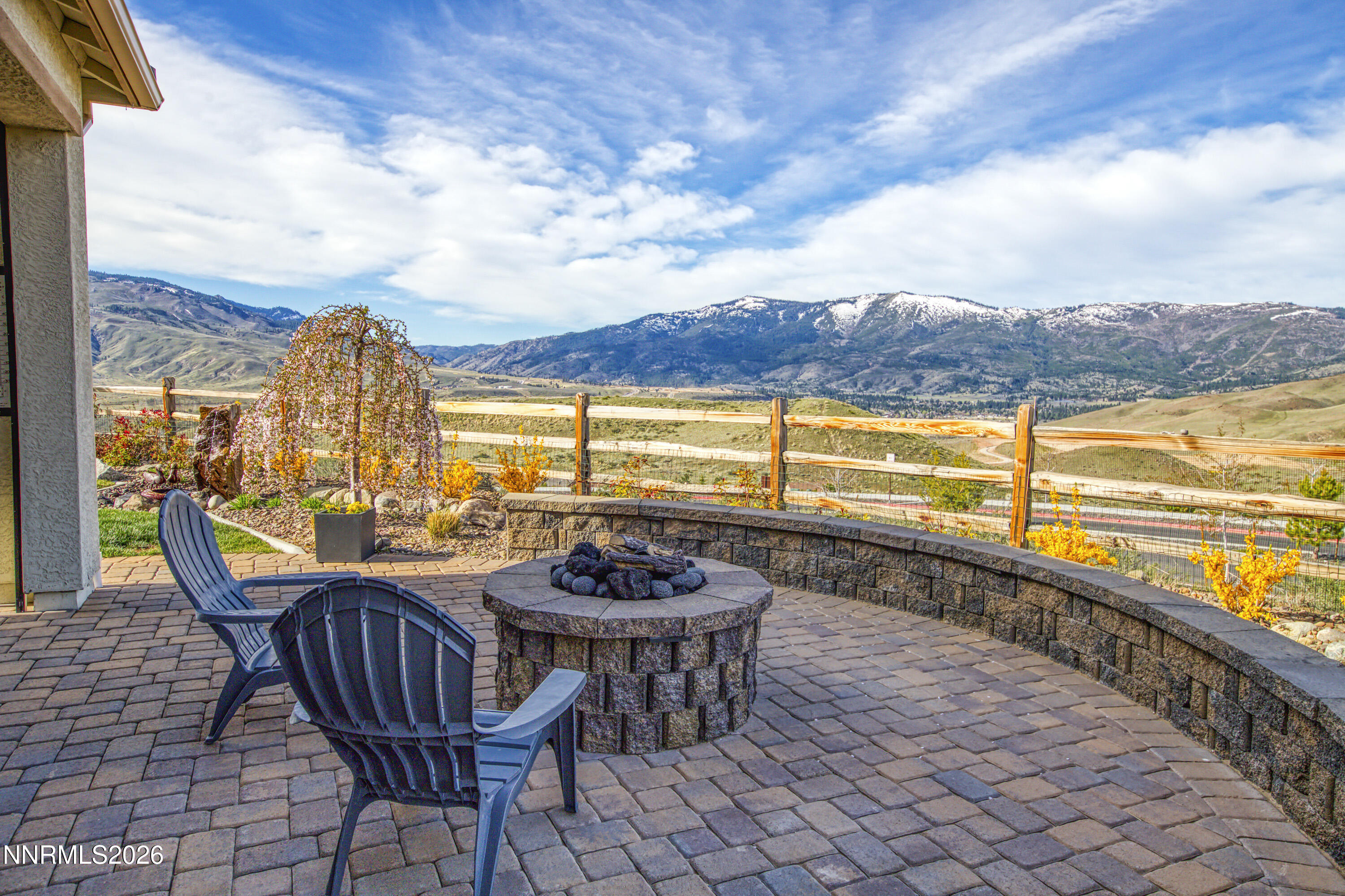 9219 Wild Skies Court Reno, NV 89523 - Photo 18 of 38 a view of a swimming pool with outdoor seating