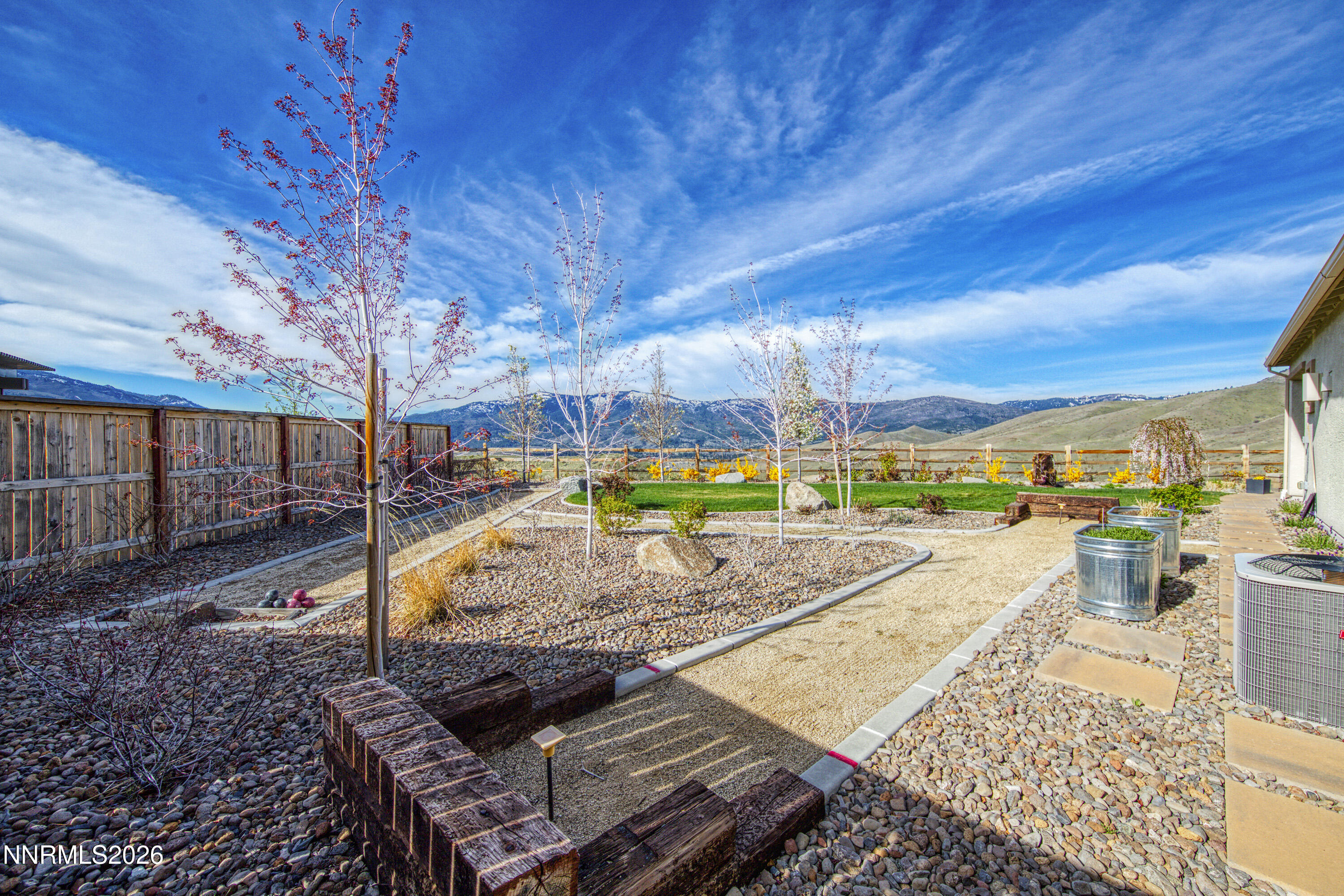 9219 Wild Skies Court Reno, NV 89523 - Photo 20 of 38 a view of a swimming pool with a patio