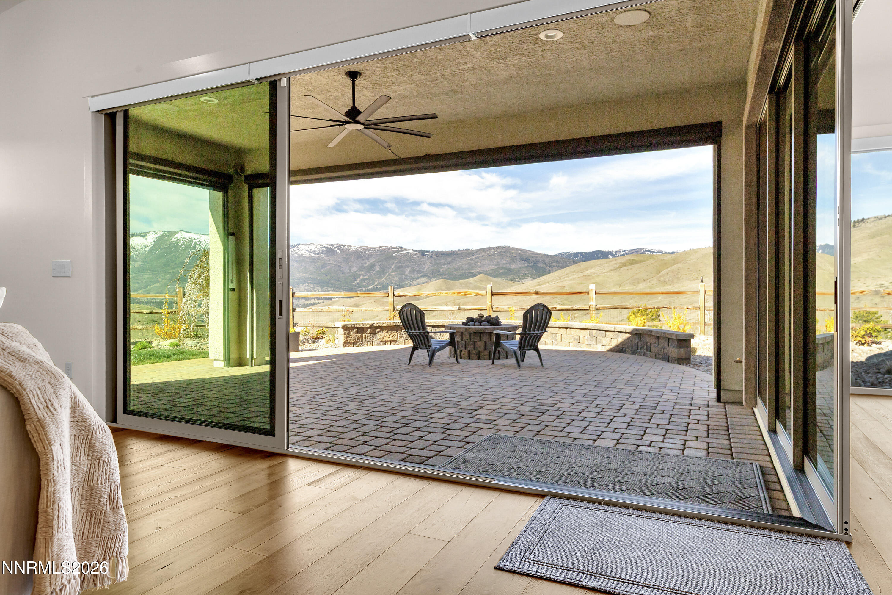 9219 Wild Skies Court Reno, NV 89523 - Photo 23 of 38 a floor to ceiling window with an outdoor view