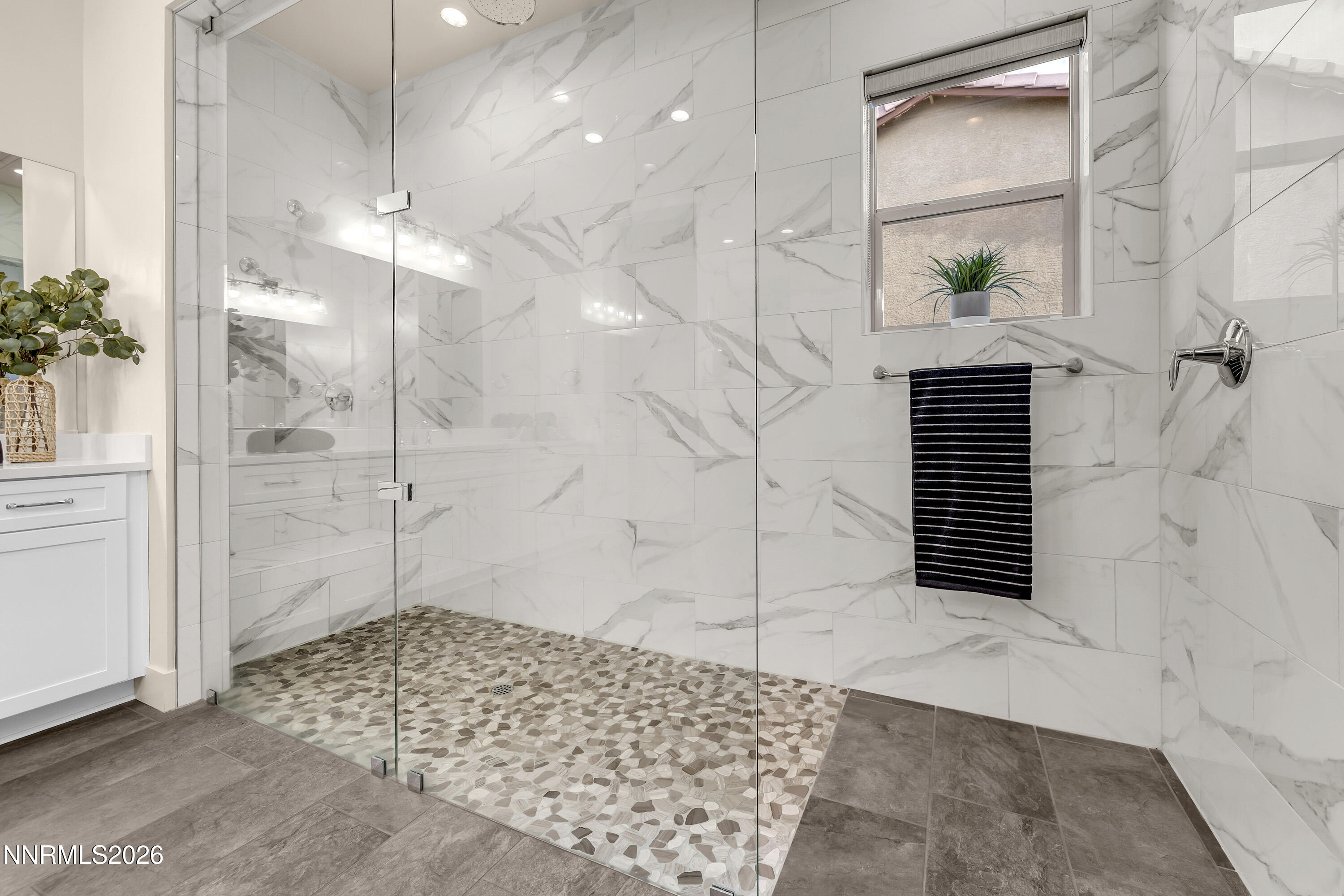 9219 Wild Skies Court Reno, NV 89523 - Photo 28 of 38 a bathroom with a shower