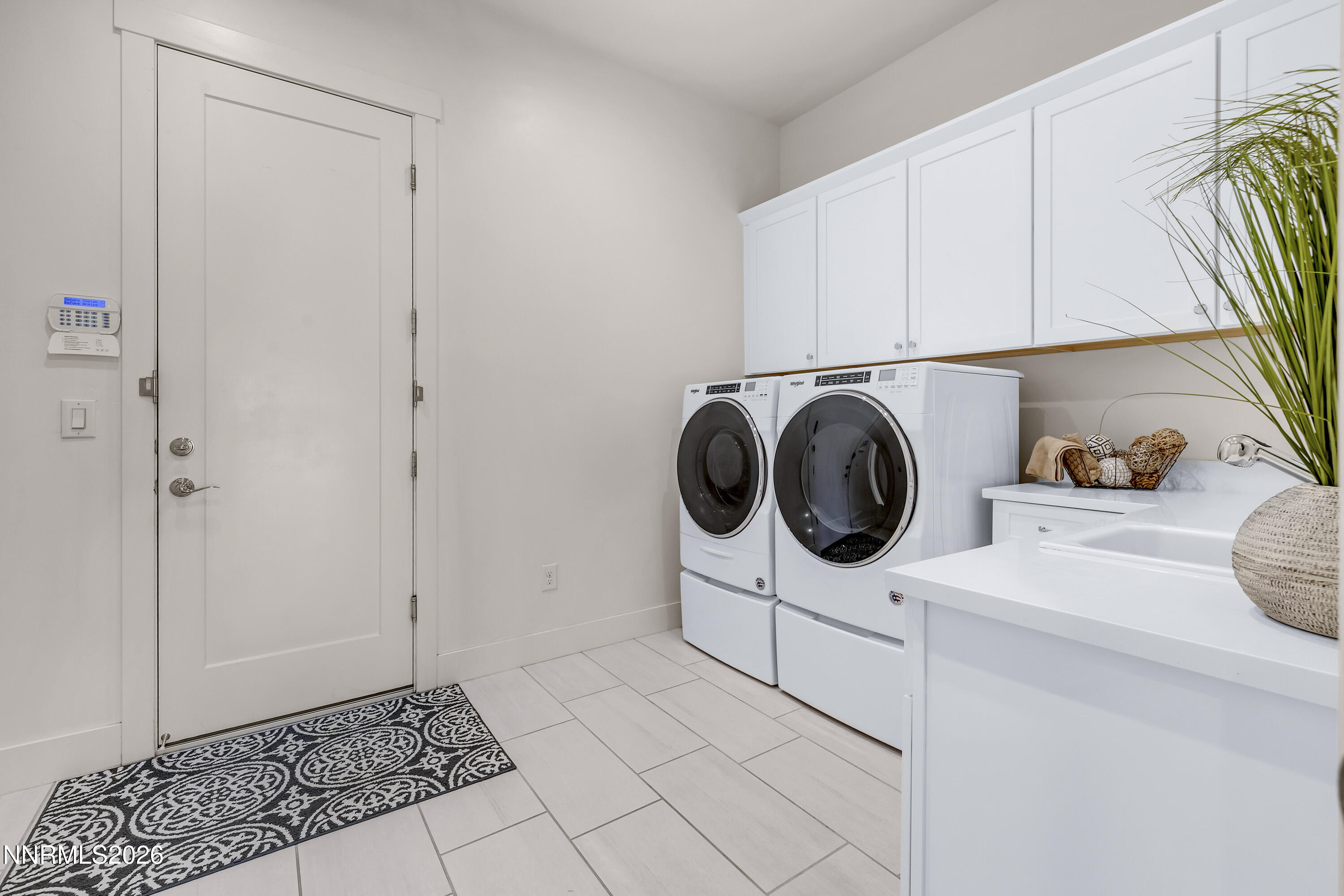 9219 Wild Skies Court Reno, NV 89523 - Photo 35 of 38 a utility room with dryer and washer