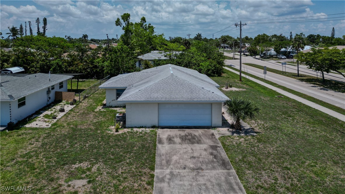 4646 Palm Tree Boulevard Cape Coral, FL 33904 - Photo 27 of 36 a house view with a garden space