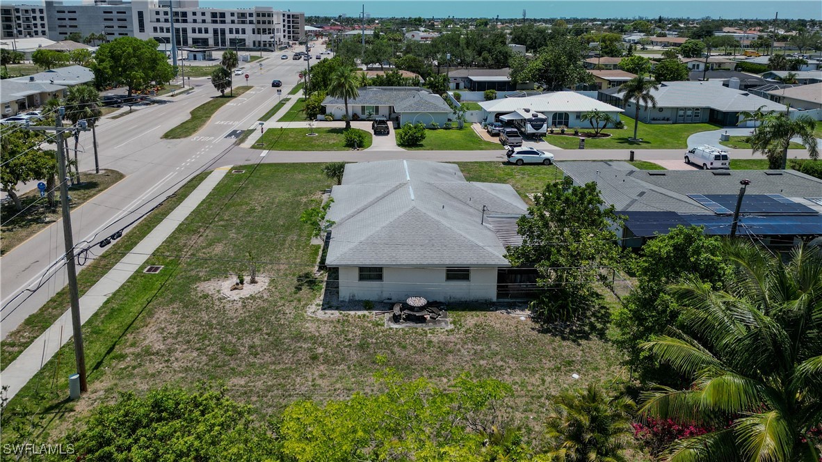 4646 Palm Tree Boulevard Cape Coral, FL 33904 - Photo 31 of 36 an aerial view of a house with garden space and street view