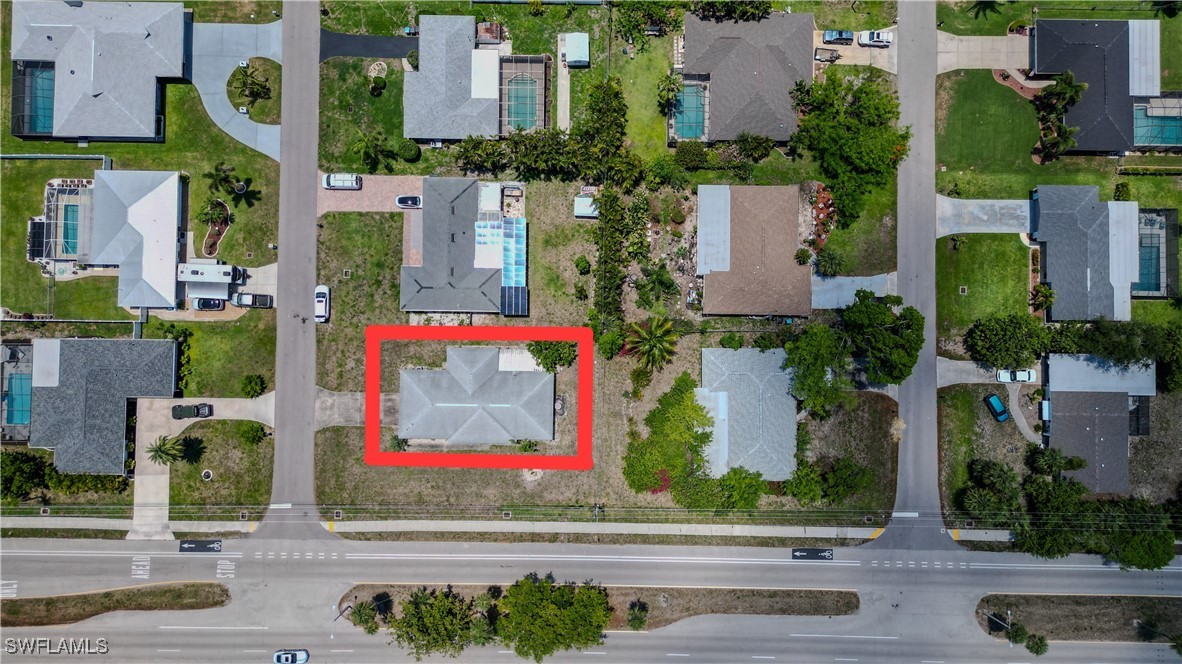 4646 Palm Tree Boulevard Cape Coral, FL 33904 - Photo 34 of 36 an aerial view of multiple houses