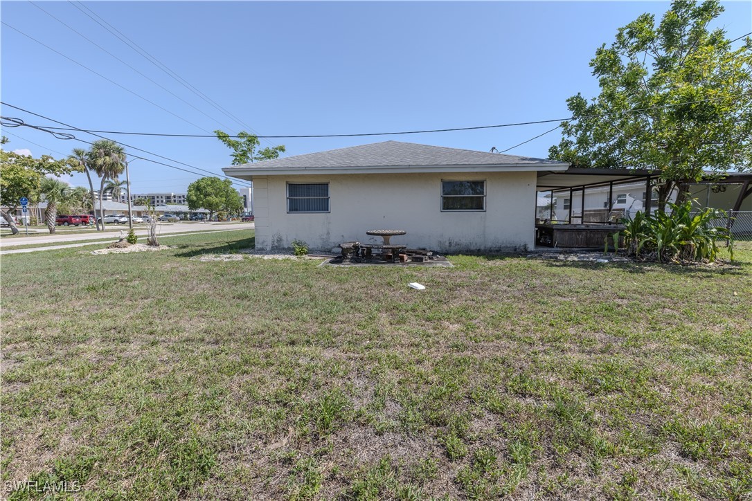 4646 Palm Tree Boulevard Cape Coral, FL 33904 - Photo 5 of 36 a view of a house with a back yard
