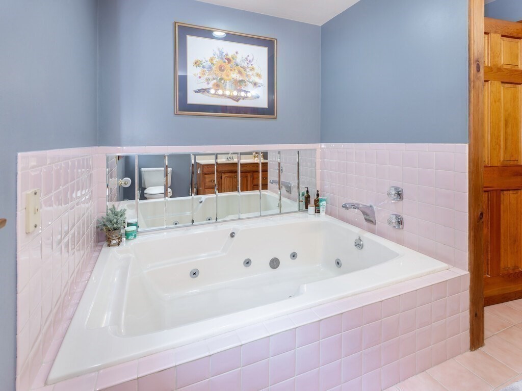 28 Cottage Road Dudley, MA 01571 - Photo 33 of 39 a bathroom with a bathtub and a sink