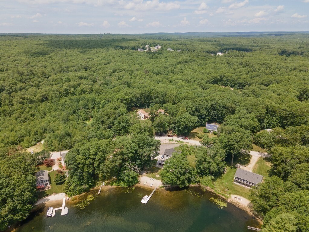 28 Cottage Road Dudley, MA 01571 - Photo 39 of 39 a view of a lake with a city