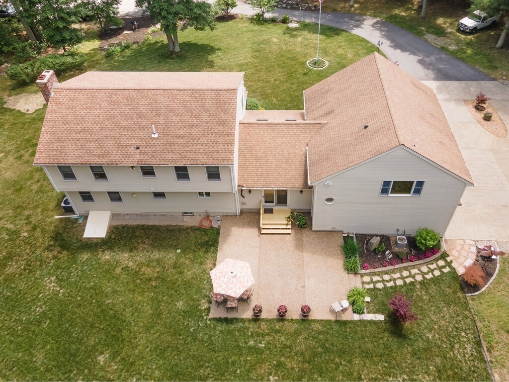 28 Cottage Road Dudley, MA 01571 - Photo 5 of 39 an aerial view of a house with outdoor space