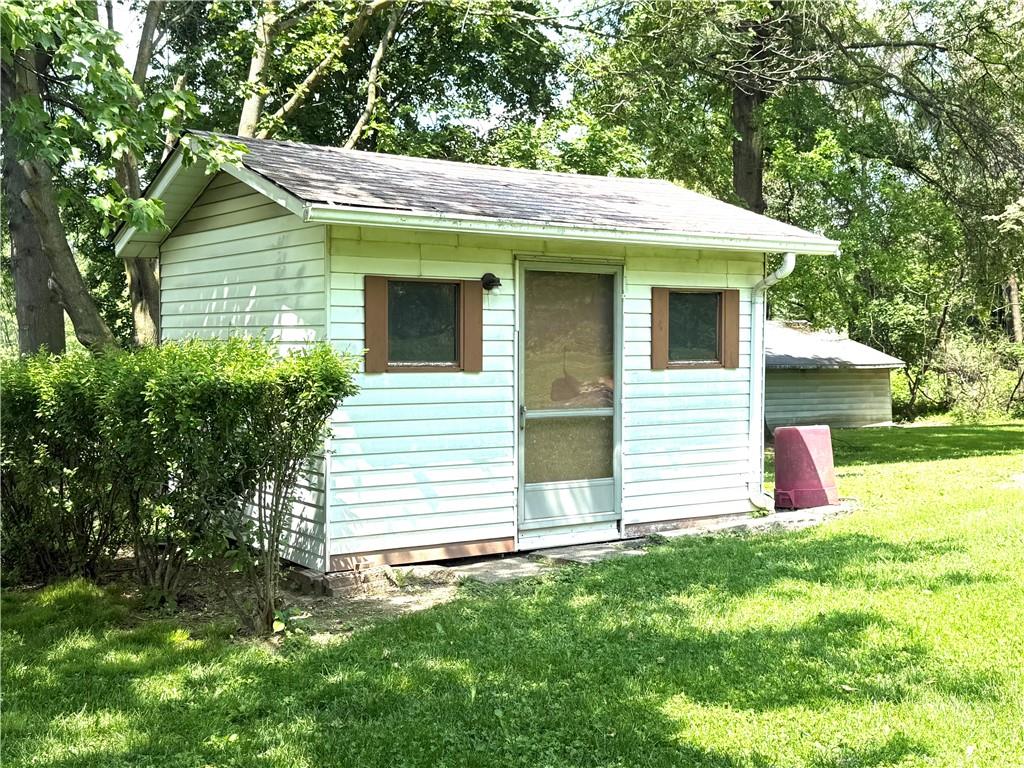 151 Huntingdon Road Wyano, PA 15695 - Photo 10 of 36 a view of a house with a yard