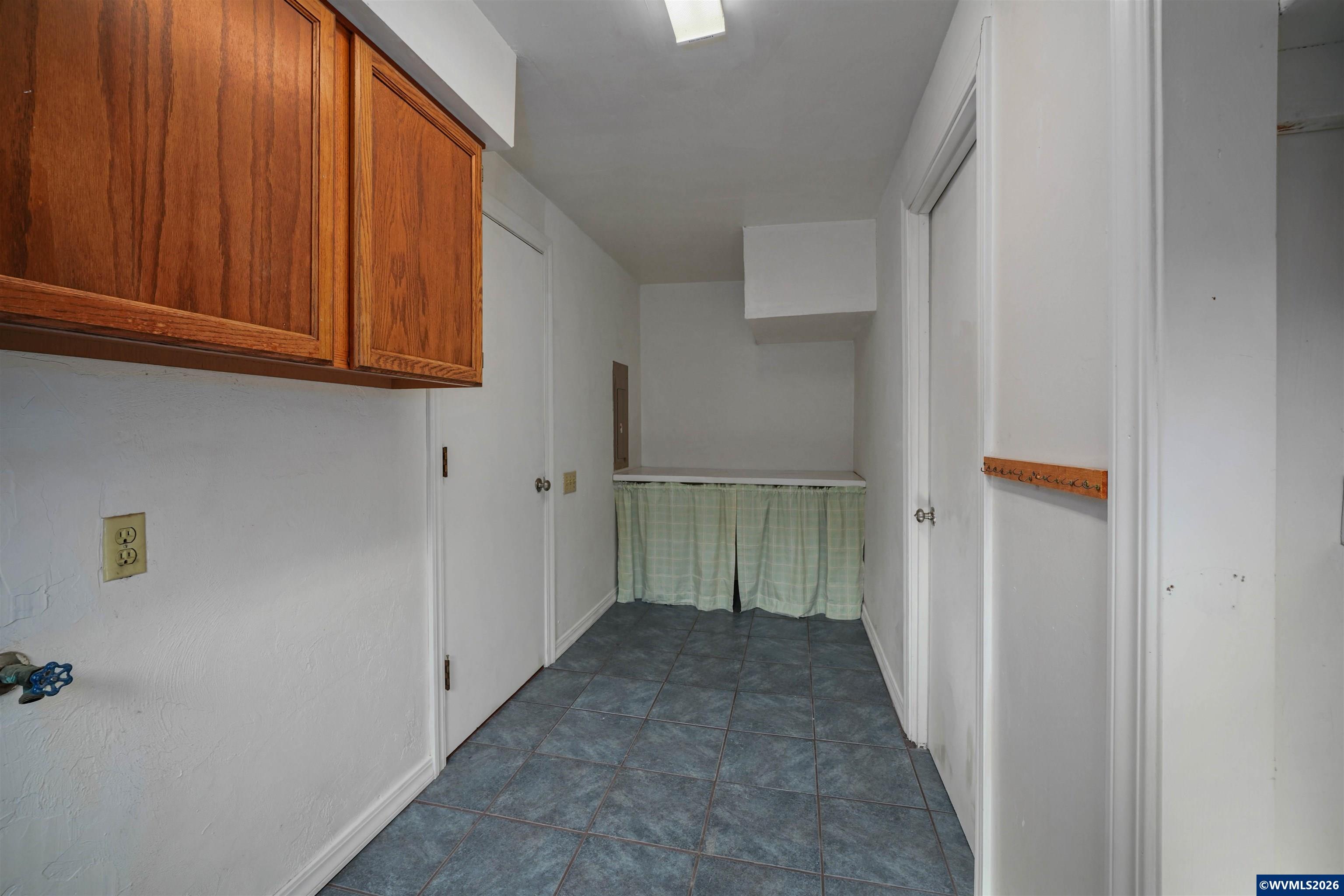 220 Northwest Downy Drive Sublimity, OR 97385 - Photo 20 of 47 a view of a room with wooden door