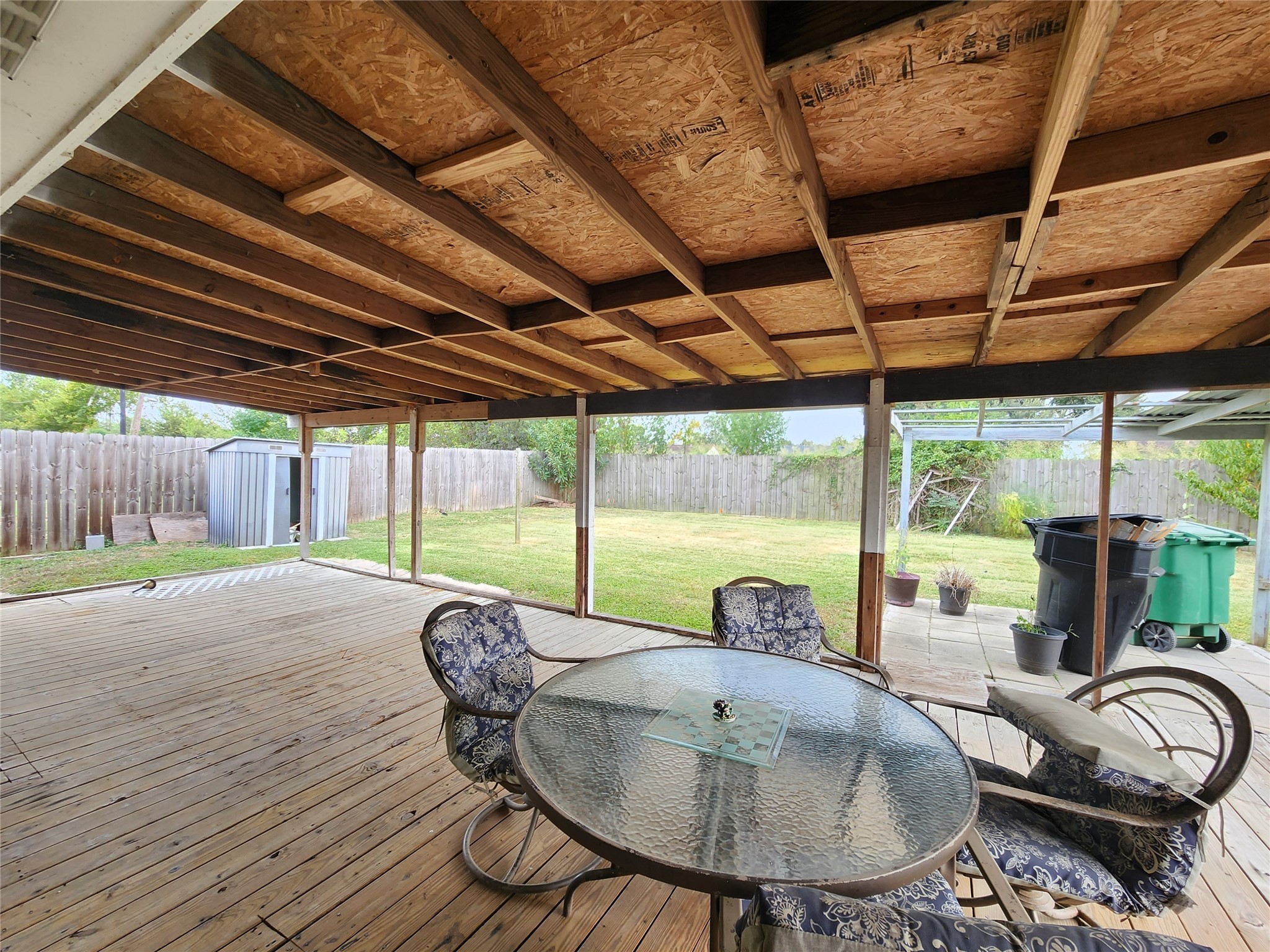8327 Bird Run Drive Houston, TX 77489 - Photo 18 of 18 a patio with a table chairs and a barbeque