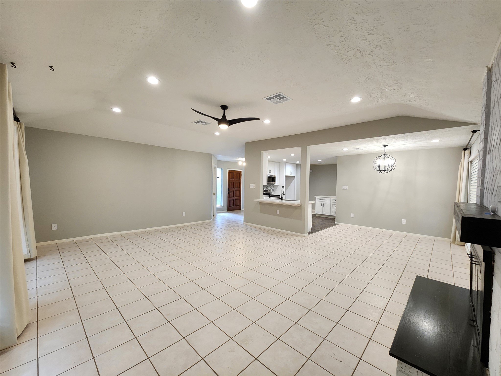 8327 Bird Run Drive Houston, TX 77489 - Photo 3 of 18 a large white room with a large mirror and glass door