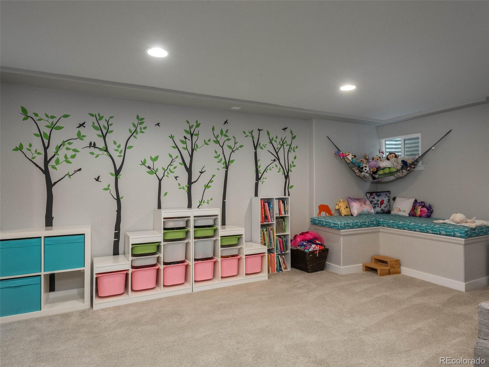 1005 Northridge Road Highlands Ranch, CO 80126 - Photo 18 of 28 a view of living room with furniture and toys