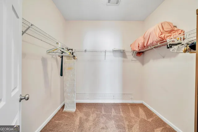 a view of a room with rack on the wall