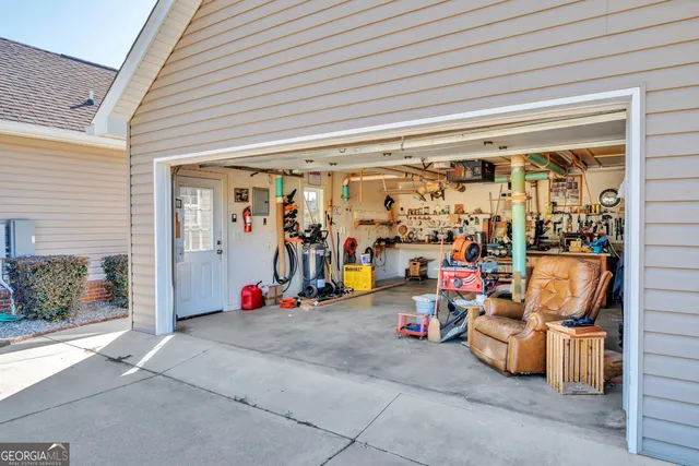 a view of parking garage with cars