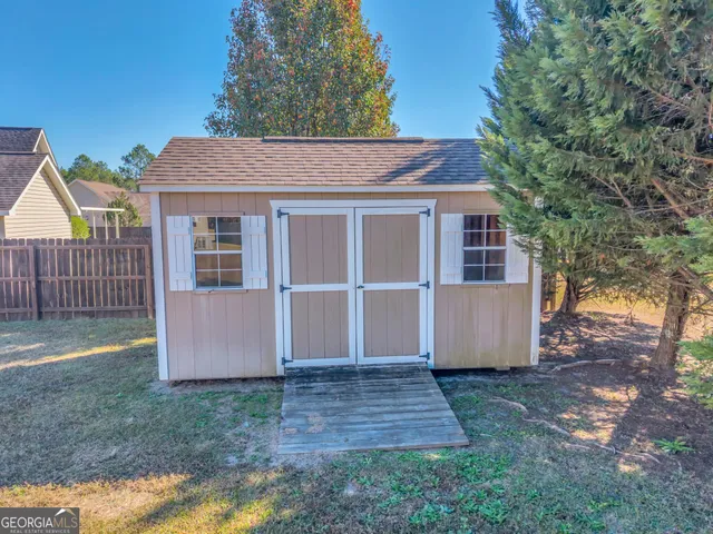 a view of backyard of house