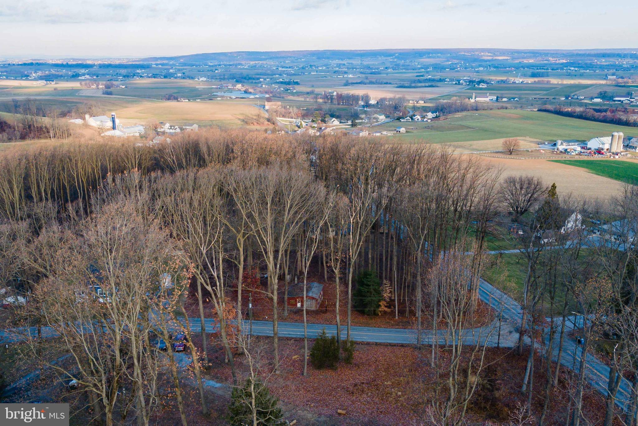 702 Lime Quarry Road Gap, PA 17527 - Photo 4 of 13 a view of a lake with a yard