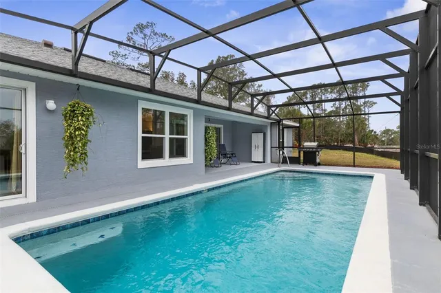 a view of a livingroom with furniture