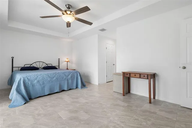 a kitchen with white cabinets