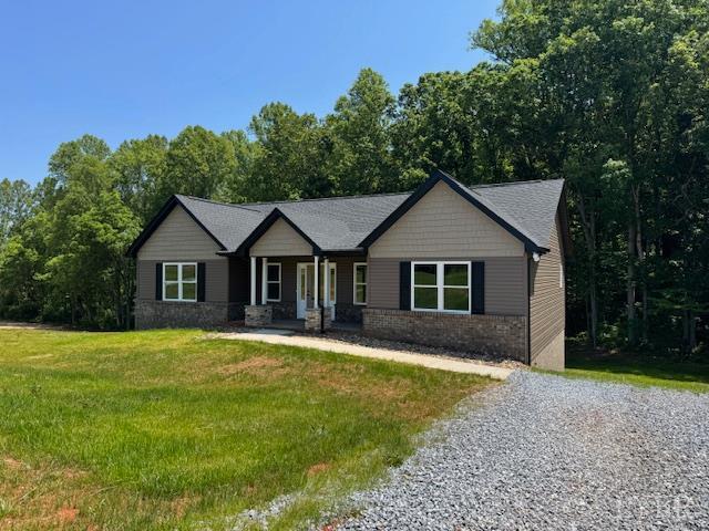 2248 Spg Grv Road Spout Spring, VA 24593 - Photo 2 of 22 a front view of a house with a yard