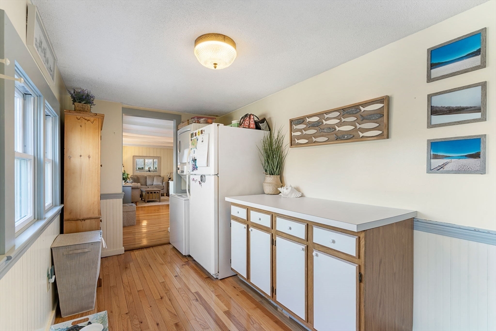11 W Road Sandwich, MA 02644 - Photo 22 of 42 a kitchen with stainless steel appliances a refrigerator and a stove top oven