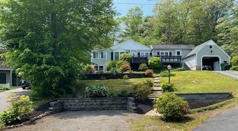 11 W Road Sandwich, MA 02644 - Photo 3 of 42 a view of a house with a garden