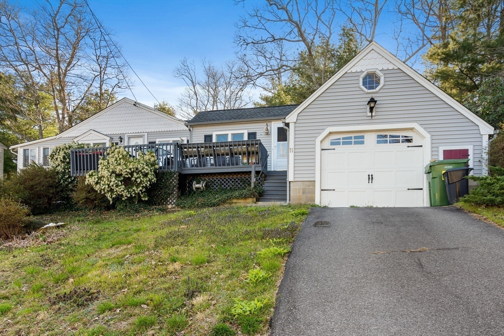 11 W Road Sandwich, MA 02644 - Photo 5 of 42 a view of a house with a garden