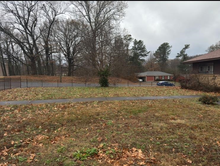 3935 North Trezevant Street Memphis, TN 38127 - Photo 6 of 6 a backyard of a house with lots of green space