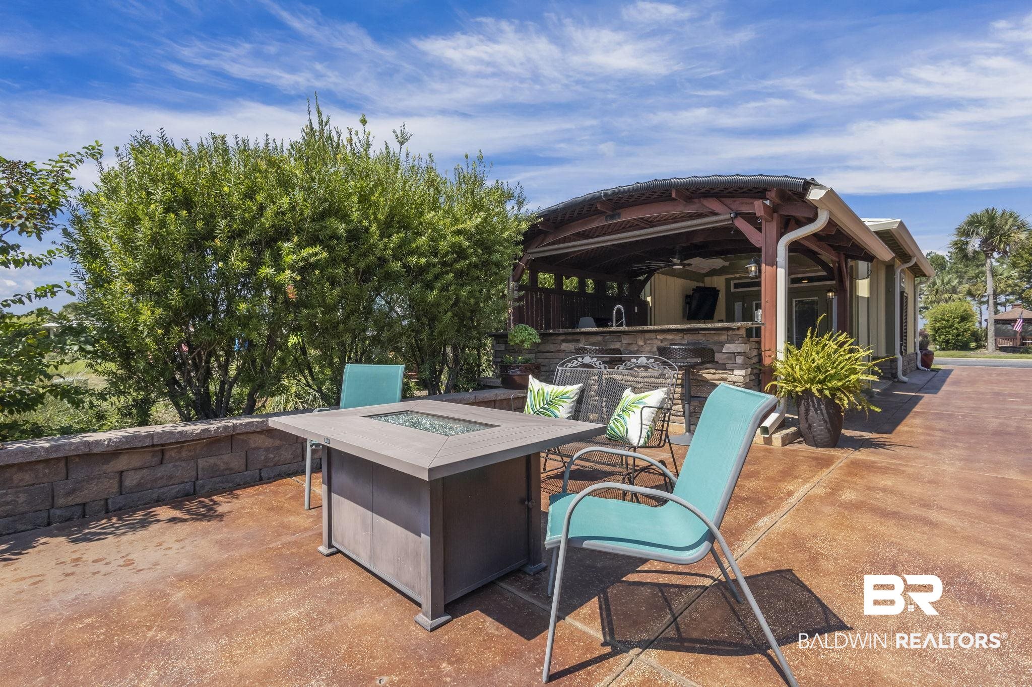 212 Magnifico Drive Foley, AL 36535 - Photo 12 of 50 View of patio featuring an outdoor fire pit