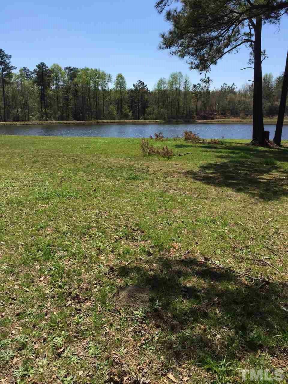 5839 Elevation Road, Unit 1 Benson, NC 27504 - Photo 5 of 6 a view of an outdoor space and yard